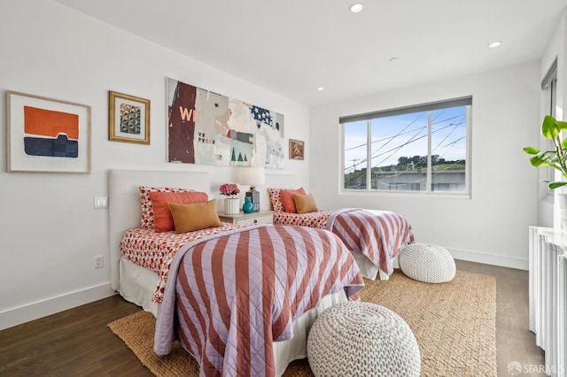 bedroom featuring recessed lighting, baseboards, and wood finished floors