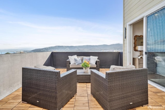 exterior space with outdoor lounge area and a mountain view