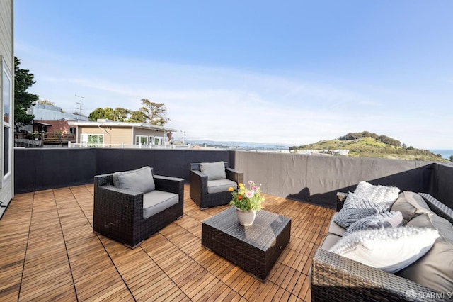 deck with an outdoor hangout area