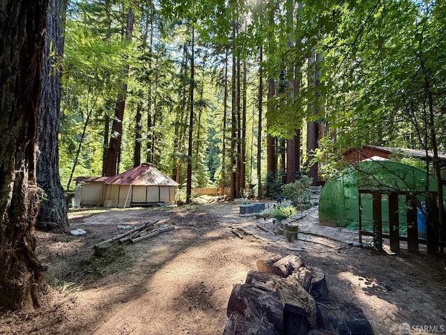 490 Huckleberry Ln, Boulder Creek, CA 95006 - view of yard featuring a view of trees and an outdoor structure