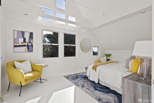 bedroom with lofted ceiling and recessed lighting