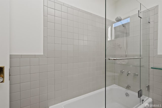 full bath with bath / shower combo with glass door