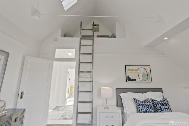 bedroom with high vaulted ceiling