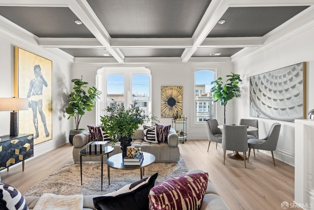 living area with light wood finished floors, beamed ceiling, and coffered ceiling