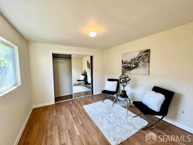 590 Hurlingame Ave, Redwood City, CA 94063 - sitting room featuring wood finished floors and baseboards