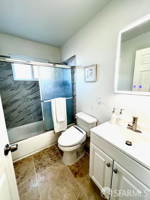 590 Hurlingame Ave, Redwood City, CA 94063 - full bathroom featuring vanity, toilet, and combined bath / shower with glass door