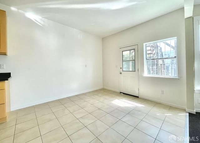 empty room featuring light tile patterned flooring