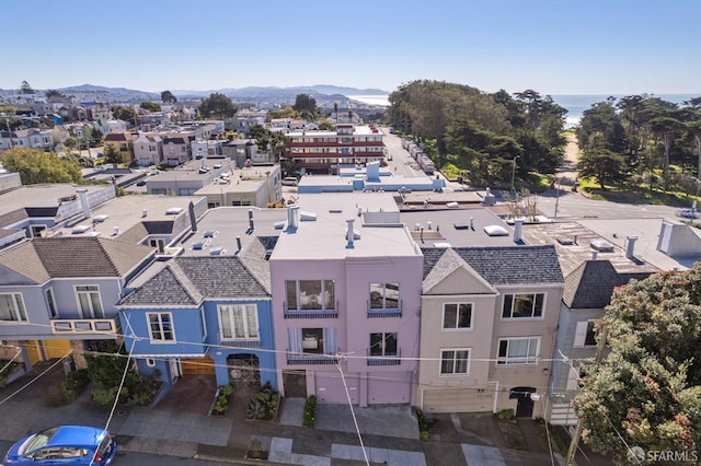 birds eye view of property with a residential view and a mountain view