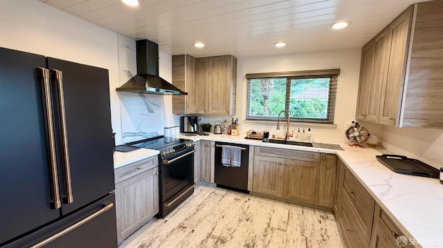kitchen with high end fridge, black electric range oven, wall chimney exhaust hood, dishwashing machine, and a sink
