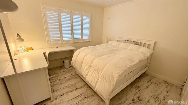 bedroom featuring baseboards