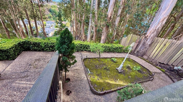 view of yard featuring a garden and fence