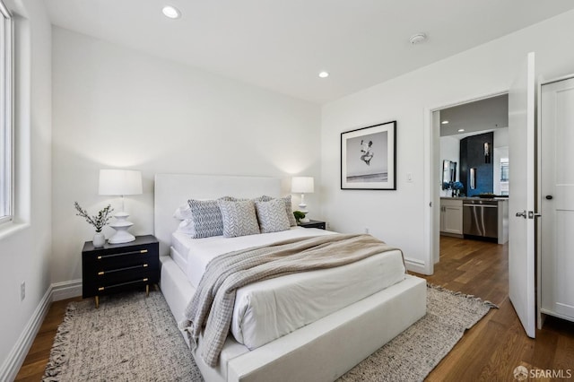 bedroom featuring dark hardwood / wood-style floors