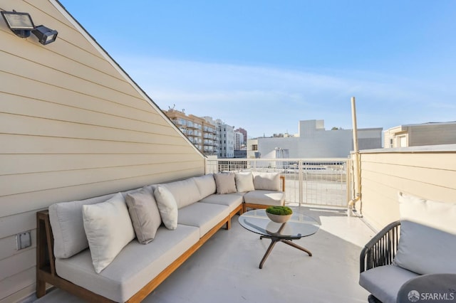 view of patio / terrace with outdoor lounge area and a balcony