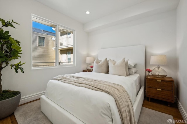 bedroom featuring hardwood / wood-style floors