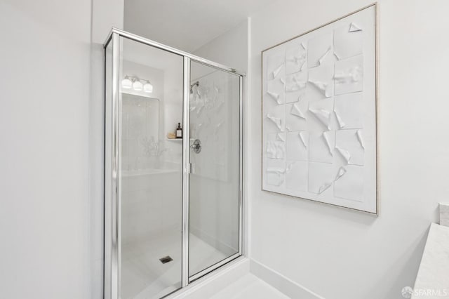 bathroom featuring walk in shower