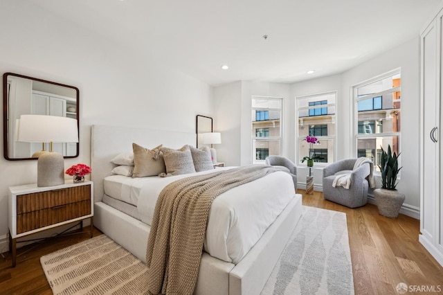 bedroom featuring light hardwood / wood-style flooring