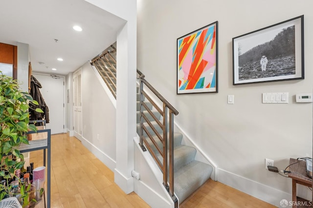 700 Illinois St Unit 3, San Francisco, CA 94107 - staircase with wood finished floors and recessed lighting