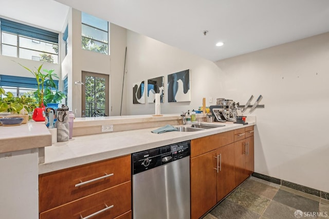 700 Illinois St Unit 3, San Francisco, CA 94107 - kitchen featuring dishwasher, brown cabinets, light countertops, recessed lighting, and a towering ceiling