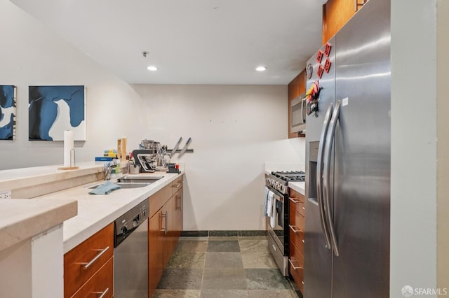 700 Illinois St Unit 3, San Francisco, CA 94107 - kitchen featuring appliances with stainless steel finishes, light countertops, brown cabinets, and recessed lighting