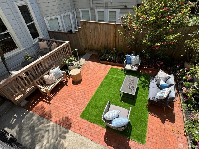 2440 Clay St, San Francisco, CA 94115 - view of patio / terrace featuring a fenced backyard and an outdoor living space