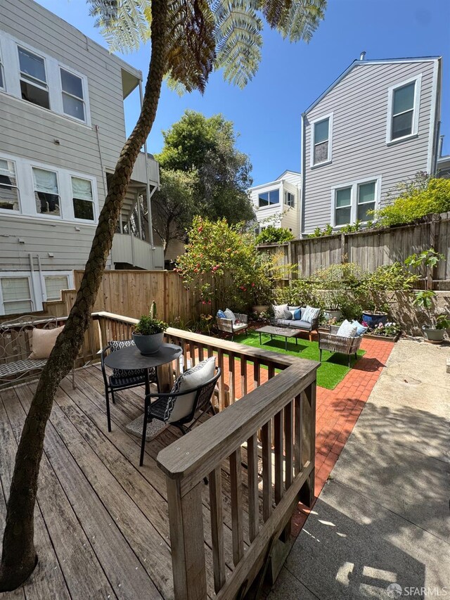2440 Clay St, San Francisco, CA 94115 - deck featuring an outdoor hangout area and a fenced backyard