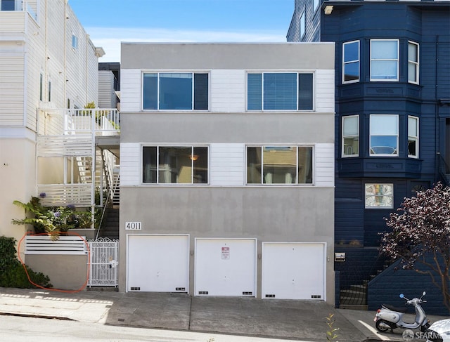 view of front of property with a garage