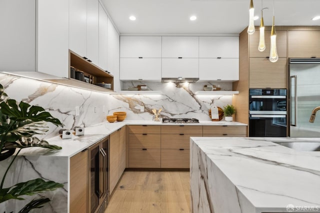 kitchen featuring beverage cooler, open shelves, light wood-style flooring, stainless steel appliances, and modern cabinets