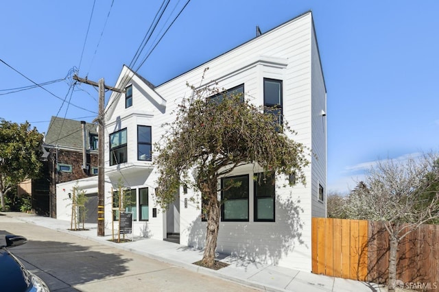 view of front of property with fence