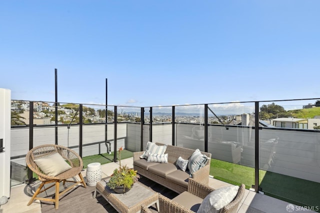 view of patio / terrace with an outdoor living space and a balcony