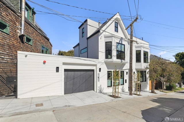 view of front of house featuring a garage and driveway