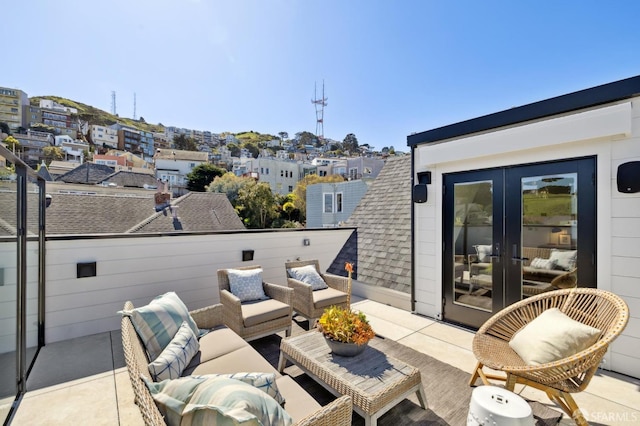 view of patio / terrace featuring french doors and outdoor lounge area