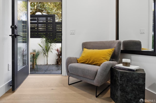 living area featuring wood finished floors