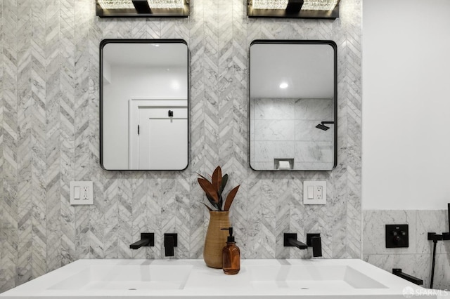 bathroom featuring tile walls and vanity