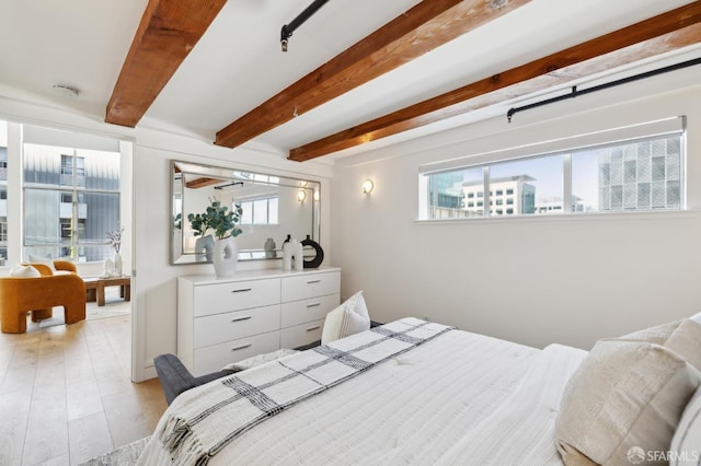 2011 3rd St Unit 6, San Francisco, CA 94107 - bedroom featuring light wood-style floors and beam ceiling