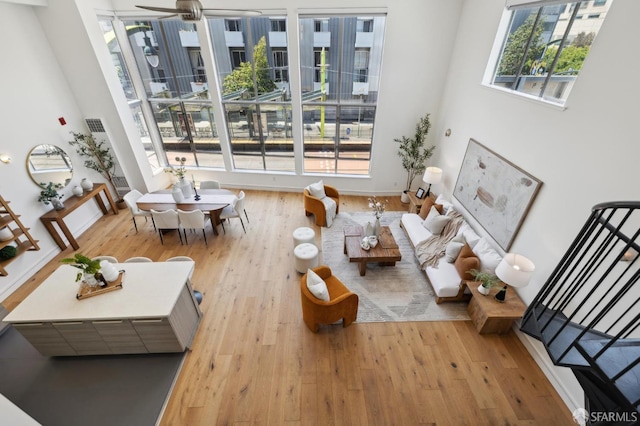 2011 3rd St Unit 6, San Francisco, CA 94107 - living room featuring wood-type flooring, plenty of natural light, and ceiling fan