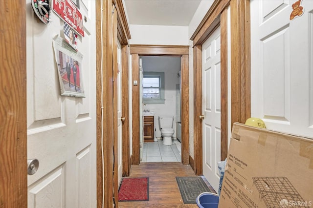 hall with light hardwood / wood-style floors