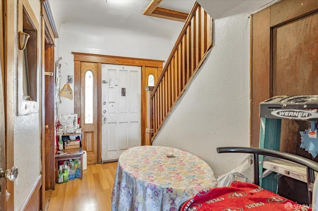 entryway with light hardwood / wood-style floors