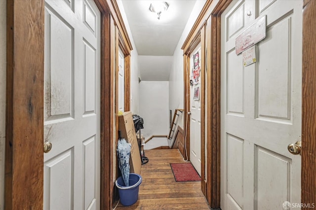 corridor featuring dark hardwood / wood-style floors