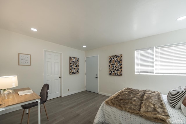 bedroom featuring dark hardwood / wood-style floors