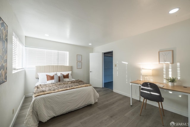 bedroom featuring wood-type flooring