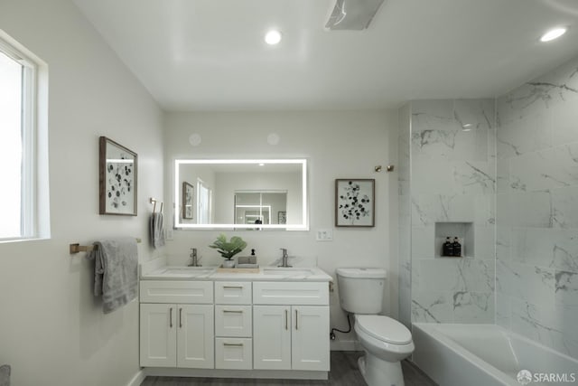 bathroom with toilet and vanity