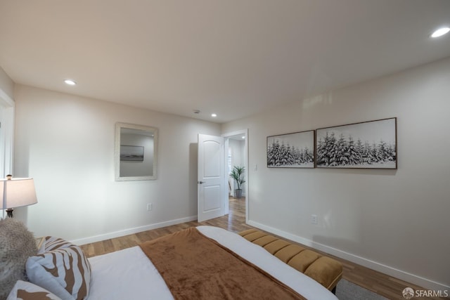 bedroom featuring light hardwood / wood-style floors