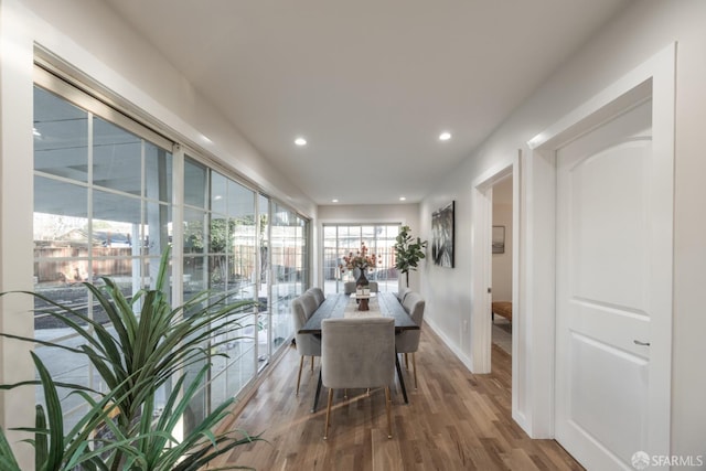 dining area featuring hardwood / wood-style floors