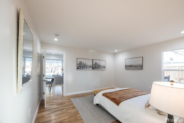 bedroom with light wood-type flooring