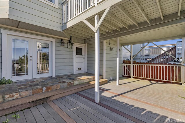 wooden deck featuring french doors