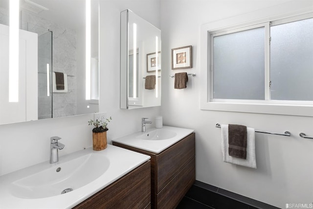 bathroom with two vanities and a sink