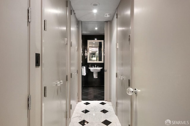 corridor with tile patterned floors