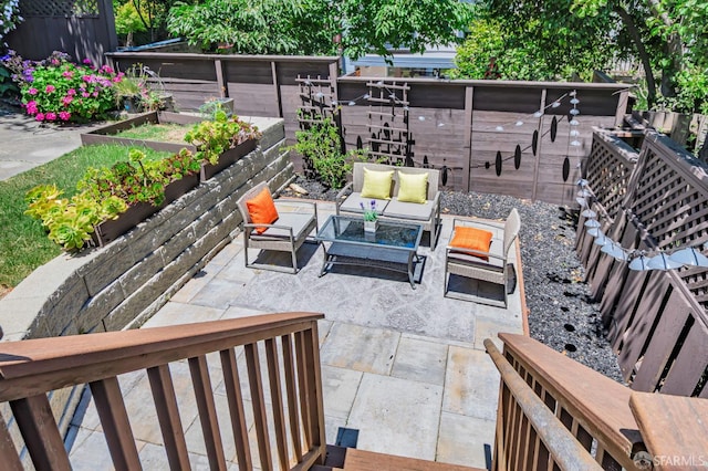 30 Eagle St, San Francisco, CA 94114 - fenced backyard featuring a patio area, outdoor lounge area, and a vegetable garden