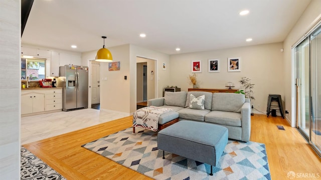 29 Woodcrest Cir, Oakland, CA 94602 - living room with recessed lighting and light wood finished floors