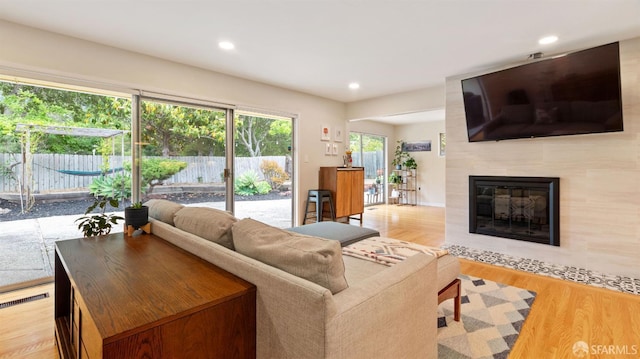 29 Woodcrest Cir, Oakland, CA 94602 - living area featuring recessed lighting, light wood-type flooring, and a fireplace